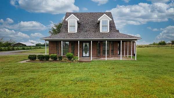 3.23 Acres of Land with Home for Sale in McLendon-Chisholm, Texas