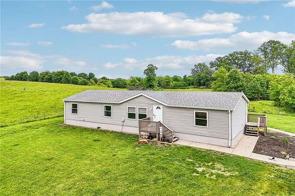 2 Acres of Land with Home for Sale in Centerview, Missouri