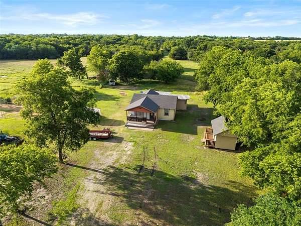 26.1 Acres of Recreational Land with Home for Sale in Farmersville, Texas