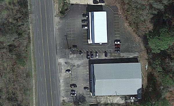 1.85 Acres of Improved Commercial Land for Sale in Center, Texas