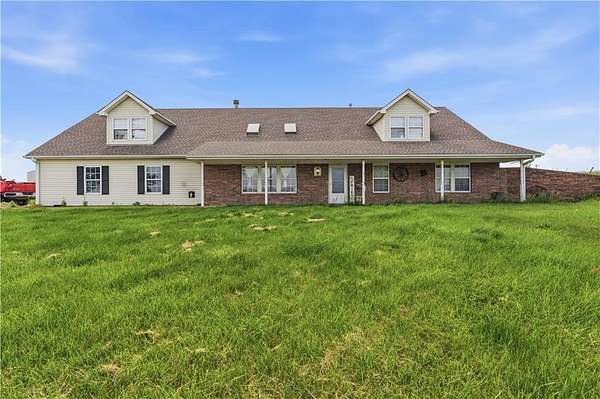 5 Acres of Land with Home for Sale in Odessa, Missouri