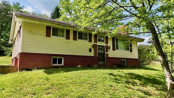10 Acres of Land with Home for Sale in Wellston, Ohio
