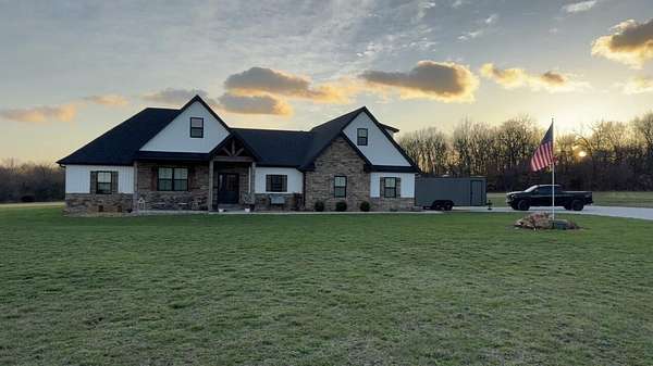 10 Acres of Land with Home for Sale in Bolivar, Missouri
