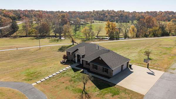 19.8 Acres of Land with Home for Sale in Brookline, Missouri