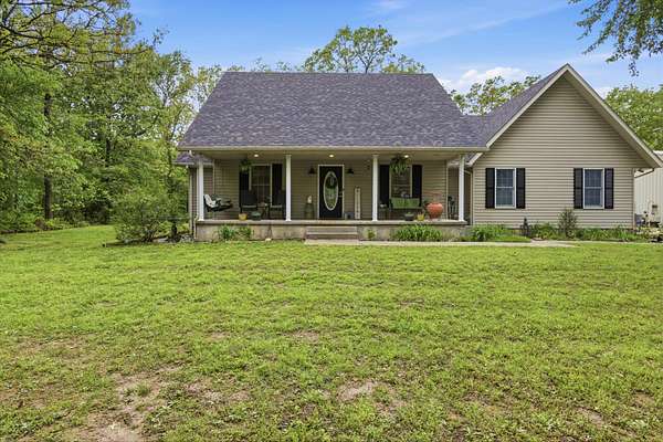 10 Acres of Land with Home for Sale in Pierce City, Missouri