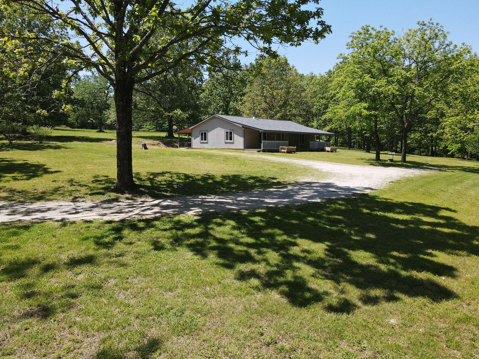 9.45 Acres of Land with Home for Sale in Dora, Missouri