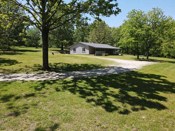 9.45 Acres of Land with Home for Sale in Dora, Missouri