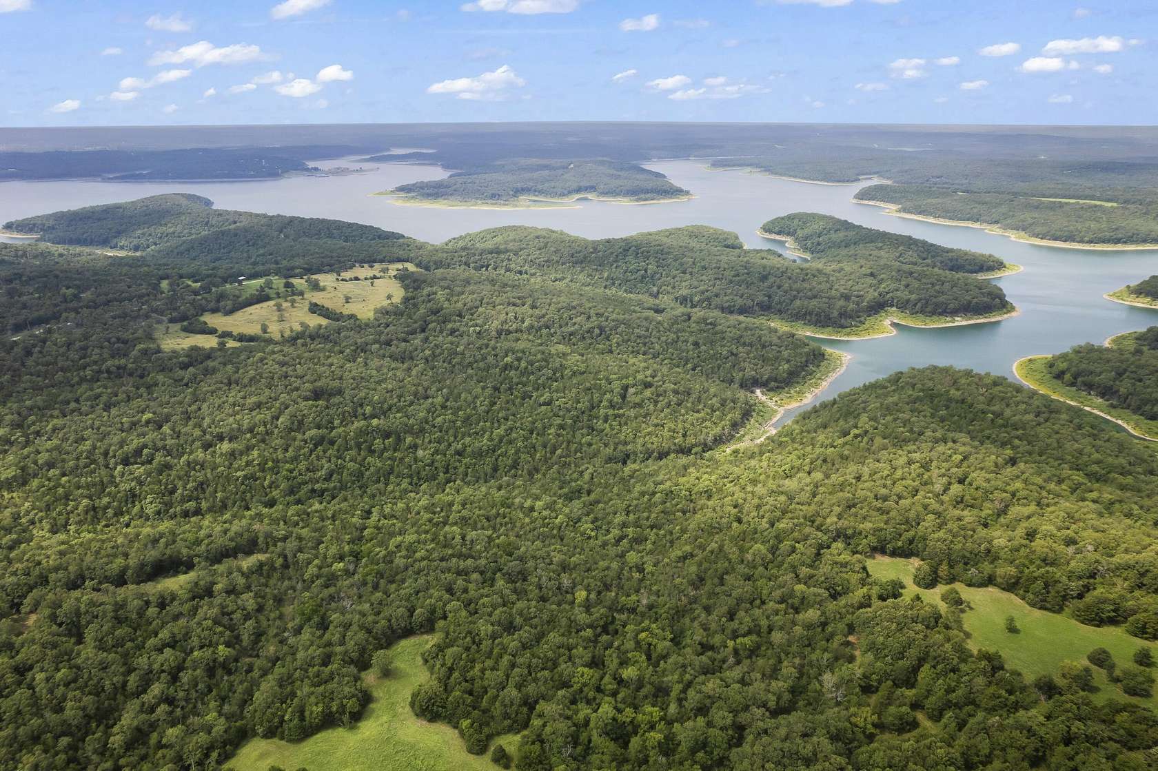 132 Acres of Recreational Land with Home for Sale in Protem, Missouri