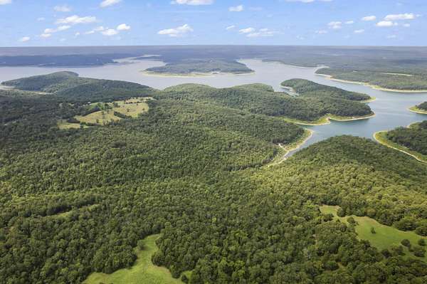 132 Acres of Recreational Land with Home for Sale in Protem, Missouri