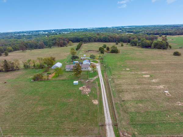 80.7 Acres of Recreational Land with Home for Sale in Weaubleau, Missouri