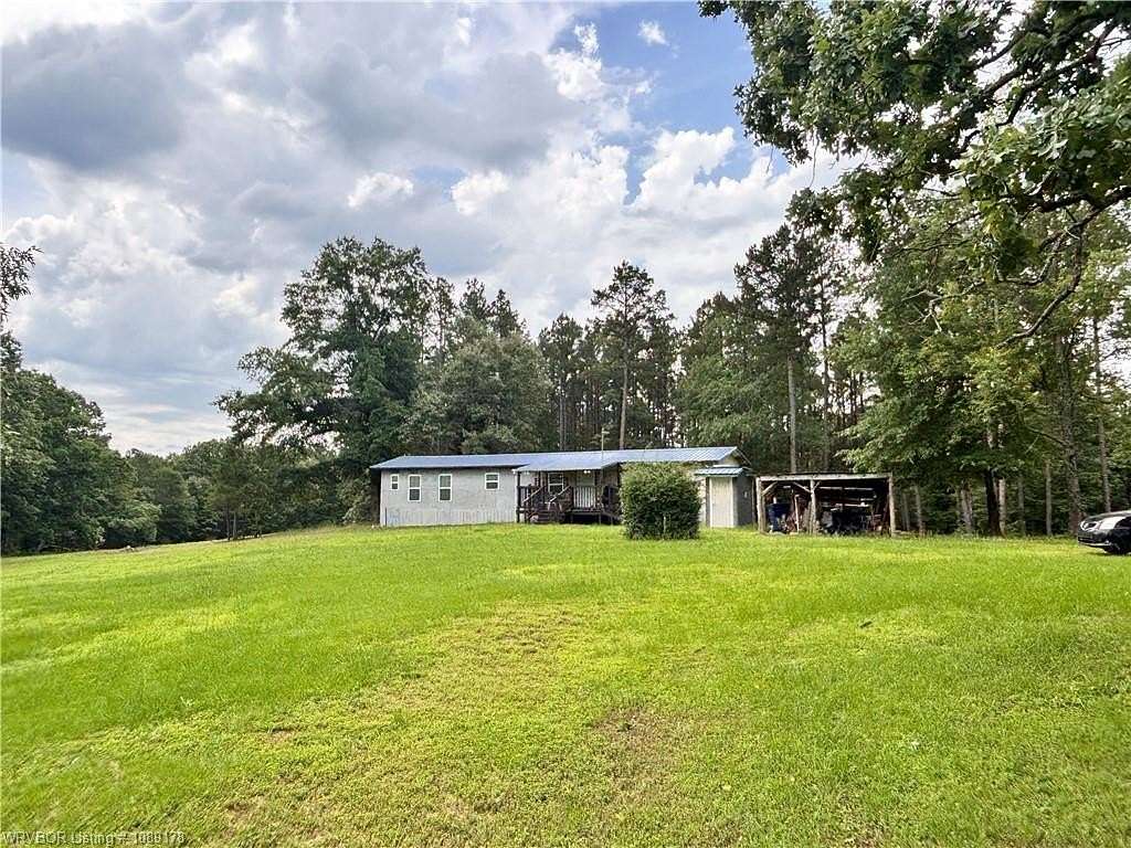 21 Acres of Recreational Land with Home for Sale in Parks, Arkansas