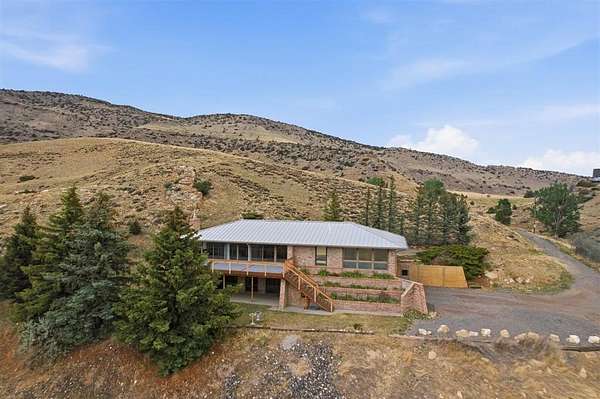5.7 Acres of Land with Home for Sale in Cody, Wyoming
