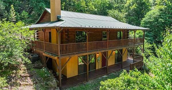 14.1 Acres of Land with Home for Sale in Purlear, North Carolina