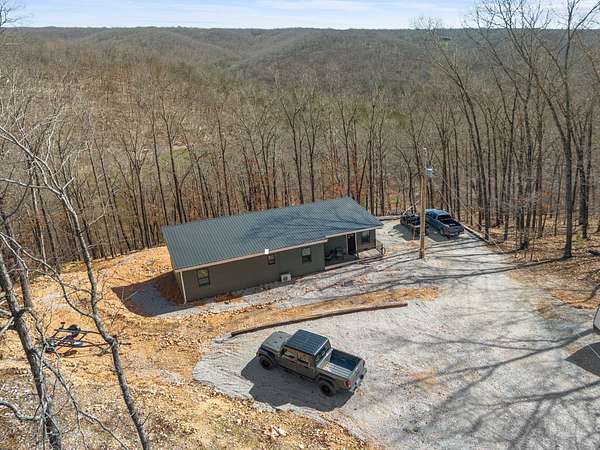 9.86 Acres of Land with Home for Sale in Galena, Missouri