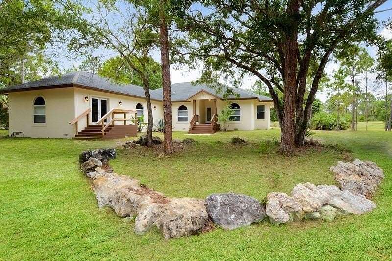 5.26 Acres of Land with Home for Sale in Loxahatchee Groves, Florida