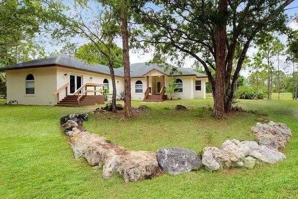 5.26 Acres of Land with Home for Sale in Loxahatchee Groves, Florida