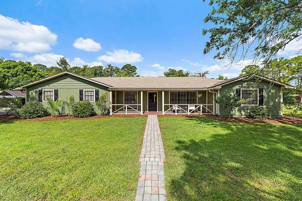 2.5 Acres of Land with Home for Sale in Jupiter, Florida