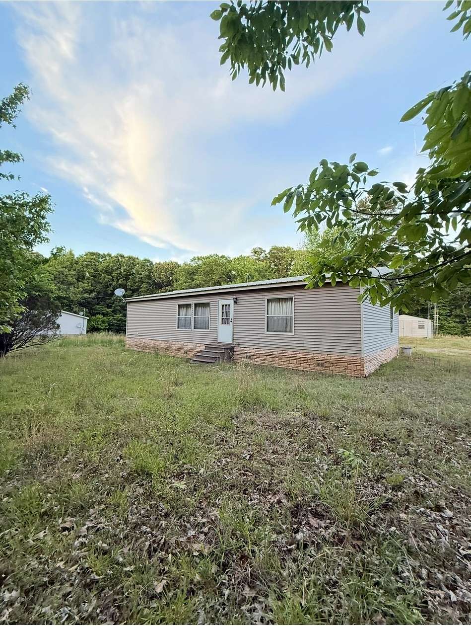 13 Acres of Land with Home for Sale in Bolivar, Tennessee