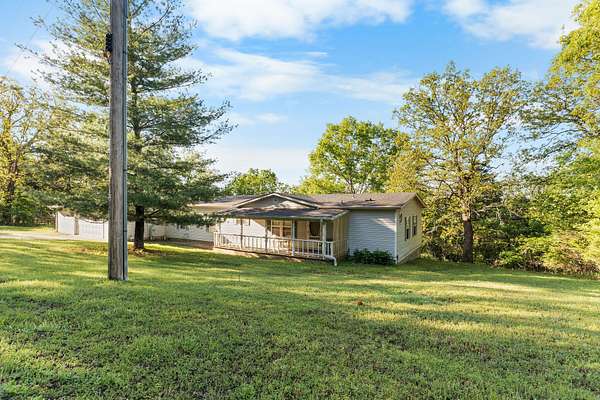 4.53 Acres of Land with Home for Sale in Forsyth, Missouri