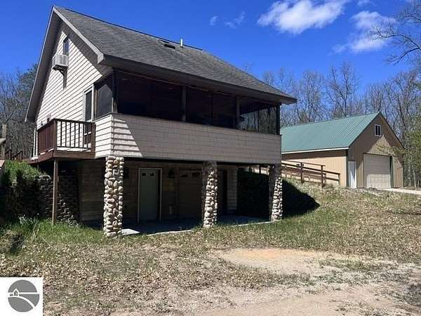5.42 Acres of Land with Home for Sale in Manistee, Michigan
