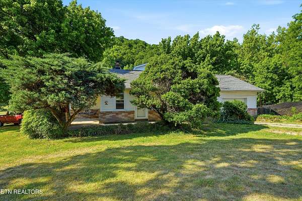 9.16 Acres of Land with Home for Sale in Powell, Tennessee