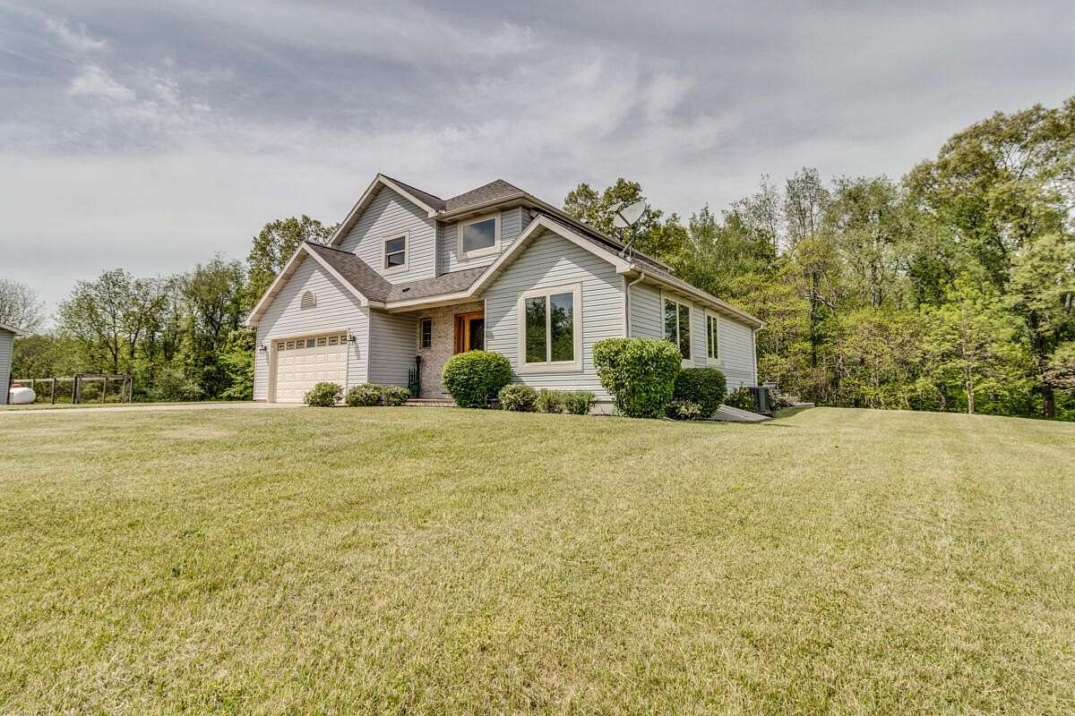 10 Acres of Land with Home for Sale in East Leroy, Michigan