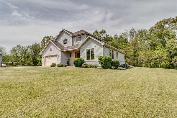 10 Acres of Land with Home for Sale in East Leroy, Michigan