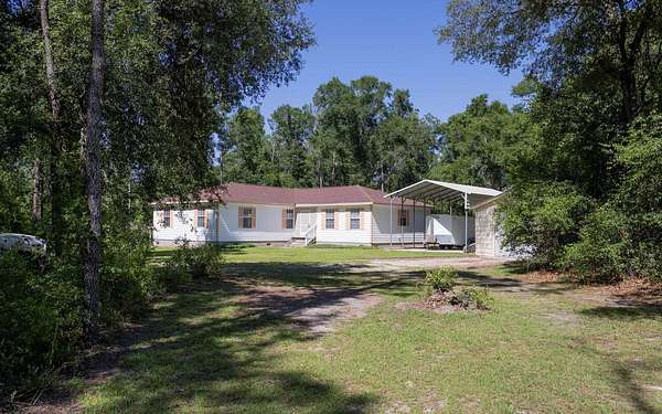 5 Acres of Land with Home for Sale in Live Oak, Florida