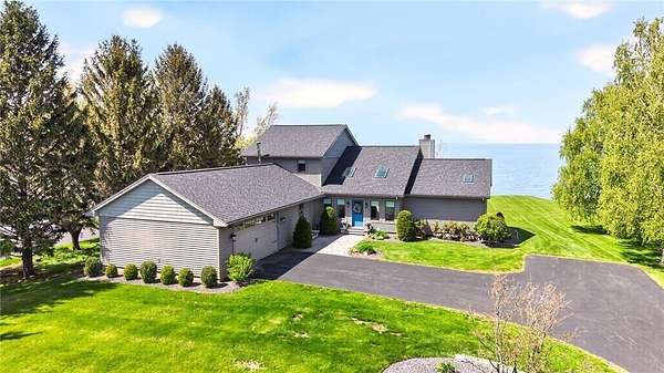 3.29 Acres of Land with Home for Sale in Williamson, New York