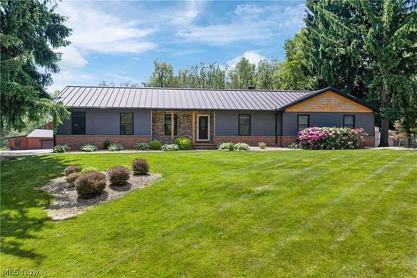 7 Acres of Land with Home for Sale in New Franklin, Ohio