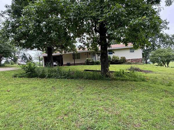6.5 Acres of Land with Home for Sale in Piggott, Arkansas