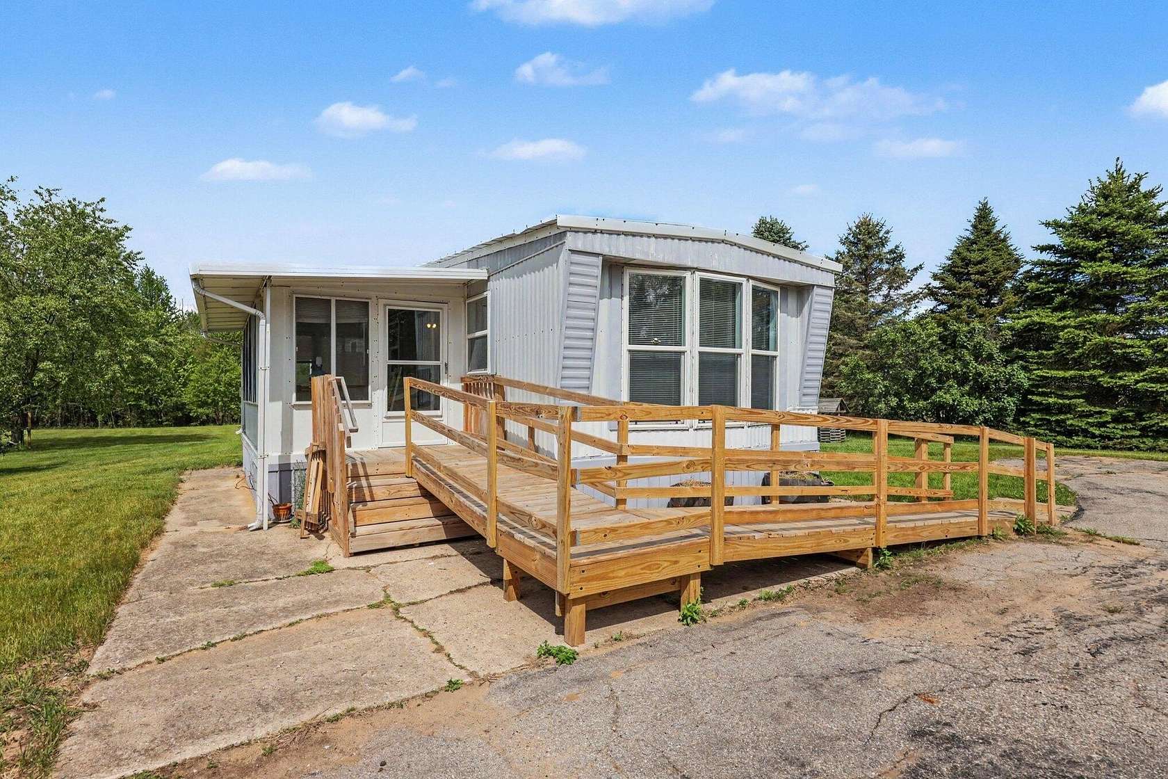 3 Acres of Land with Home for Sale in Cedar Springs, Michigan