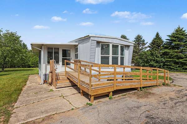 3 Acres of Land with Home for Sale in Cedar Springs, Michigan
