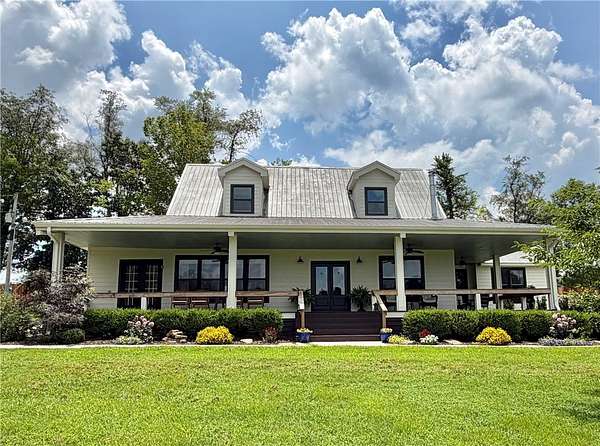 7.56 Acres of Land with Home for Sale in Farmington, Arkansas