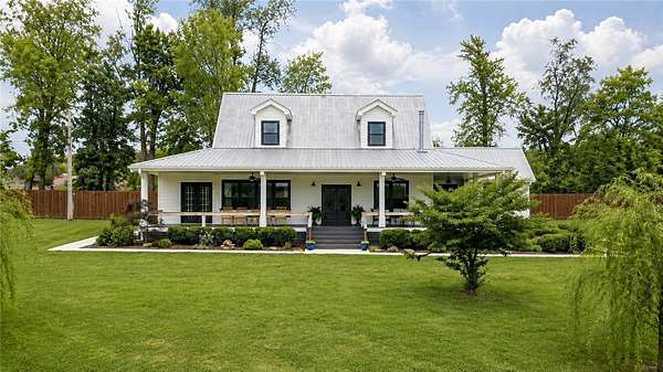 7.56 Acres of Land with Home for Sale in Farmington, Arkansas