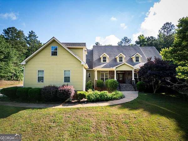 1.5 Acres of Land with Home for Sale in Arnoldsville, Georgia