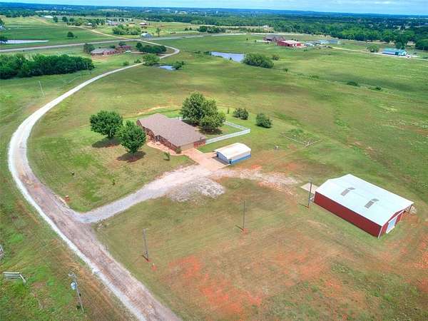 16.6 Acres of Recreational Land with Home for Sale in McLoud, Oklahoma