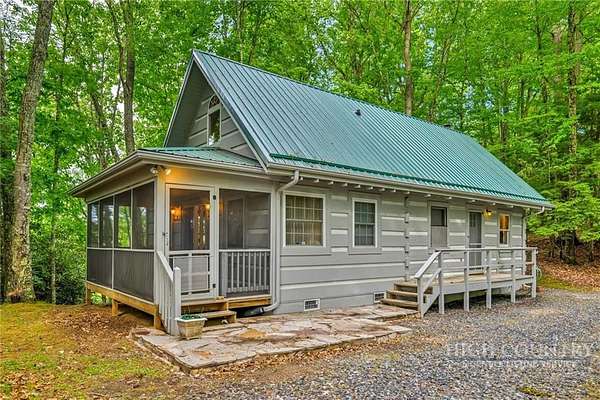 5.15 Acres of Land with Home for Sale in Lansing, North Carolina