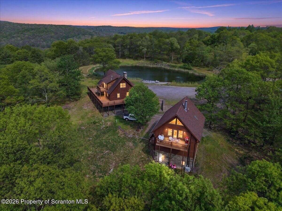242 Acres of Recreational Land with Home for Sale in Roaring Brook Township, Pennsylvania