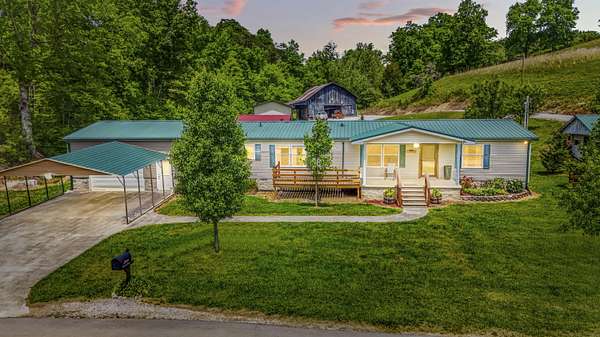 157 Acres of Land with Home for Sale in Hazel Green, Kentucky