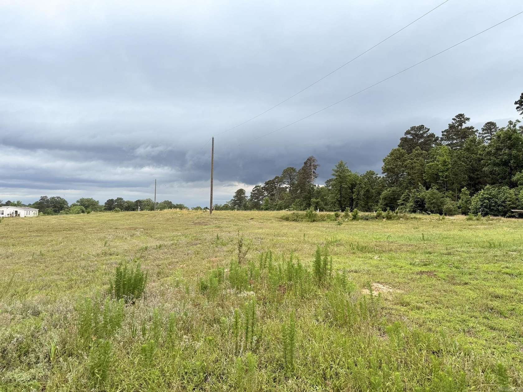 7.4 Acres of Land with Home for Sale in Bismarck, Arkansas