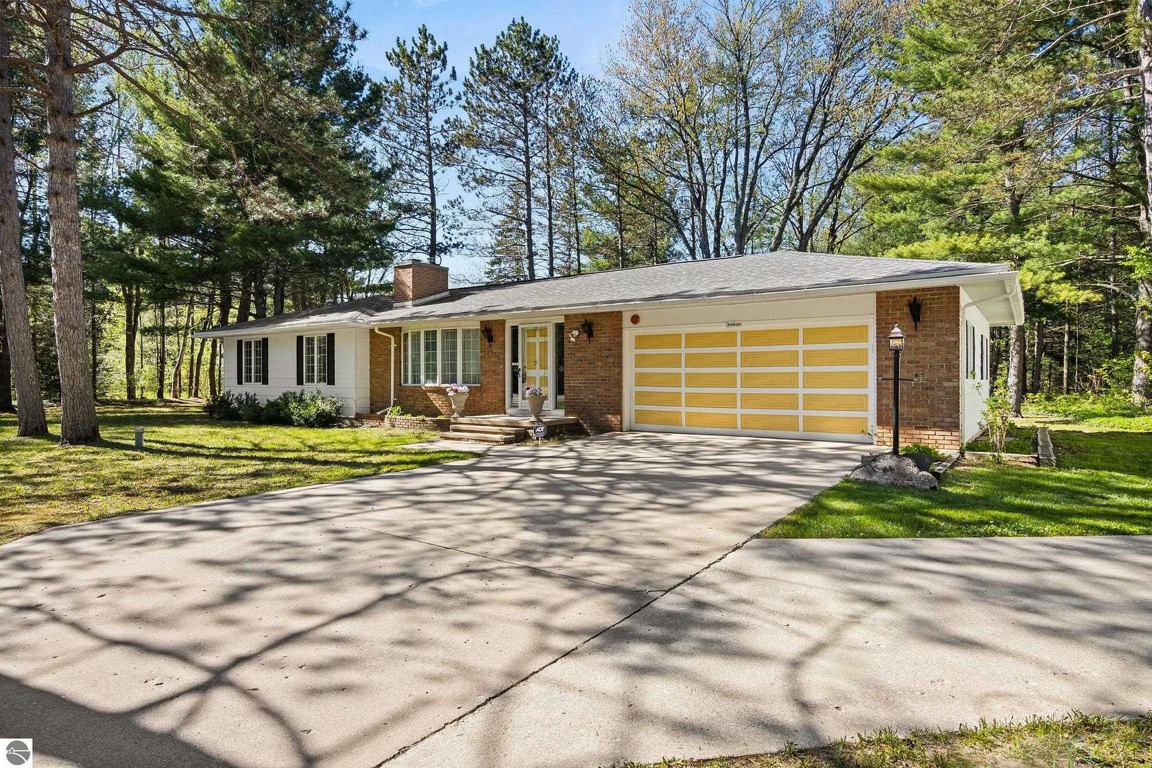 2.5 Acres of Land with Home for Sale in Interlochen, Michigan