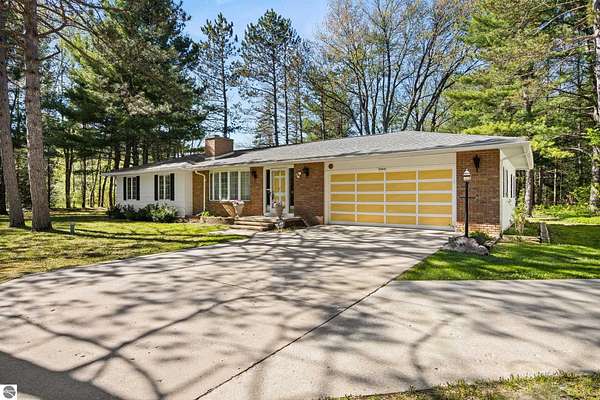 2.5 Acres of Land with Home for Sale in Interlochen, Michigan