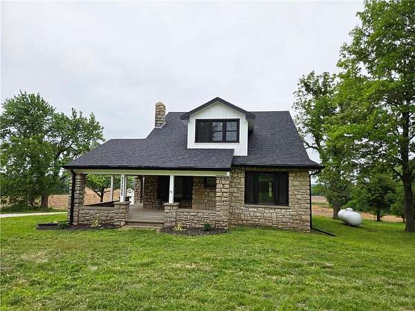 6.86 Acres of Land with Home for Sale in Sibley, Missouri