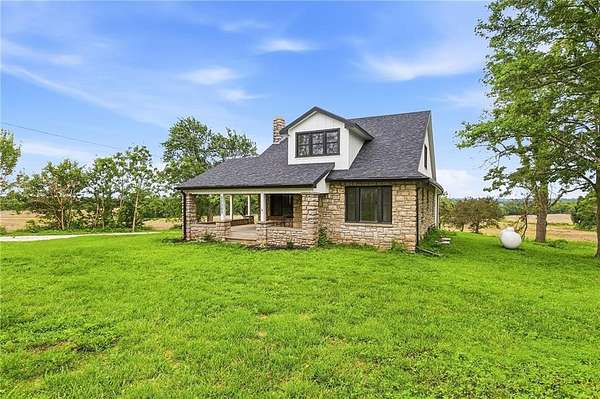 6.86 Acres of Land with Home for Sale in Sibley, Missouri