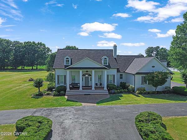 4.69 Acres of Land with Home for Sale in Jackson, Tennessee