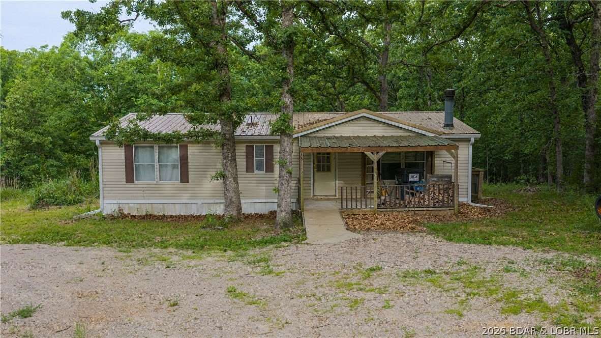 6.6 Acres of Land with Home for Sale in Montreal, Missouri