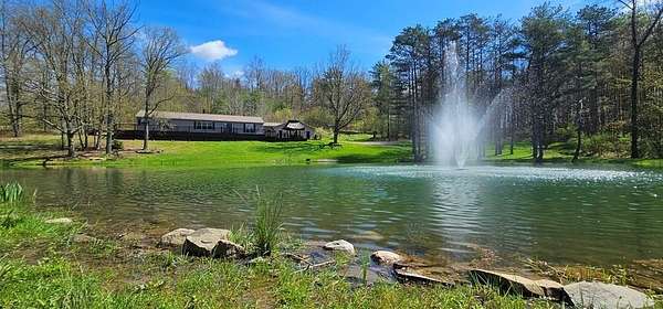 40 Acres of Recreational Land with Home for Sale in Lockwood, New York