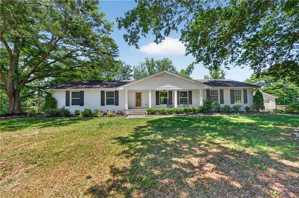 7.78 Acres of Land with Home for Sale in Canton, Georgia