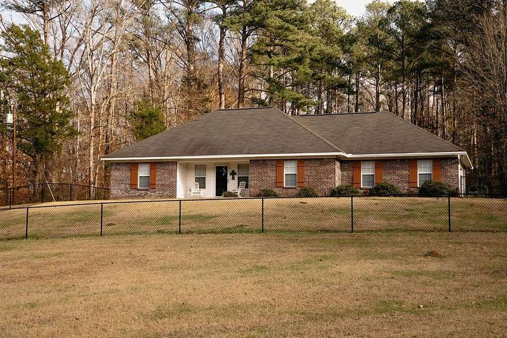 17.5 Acres of Recreational Land with Home for Sale in Gore Springs, Mississippi